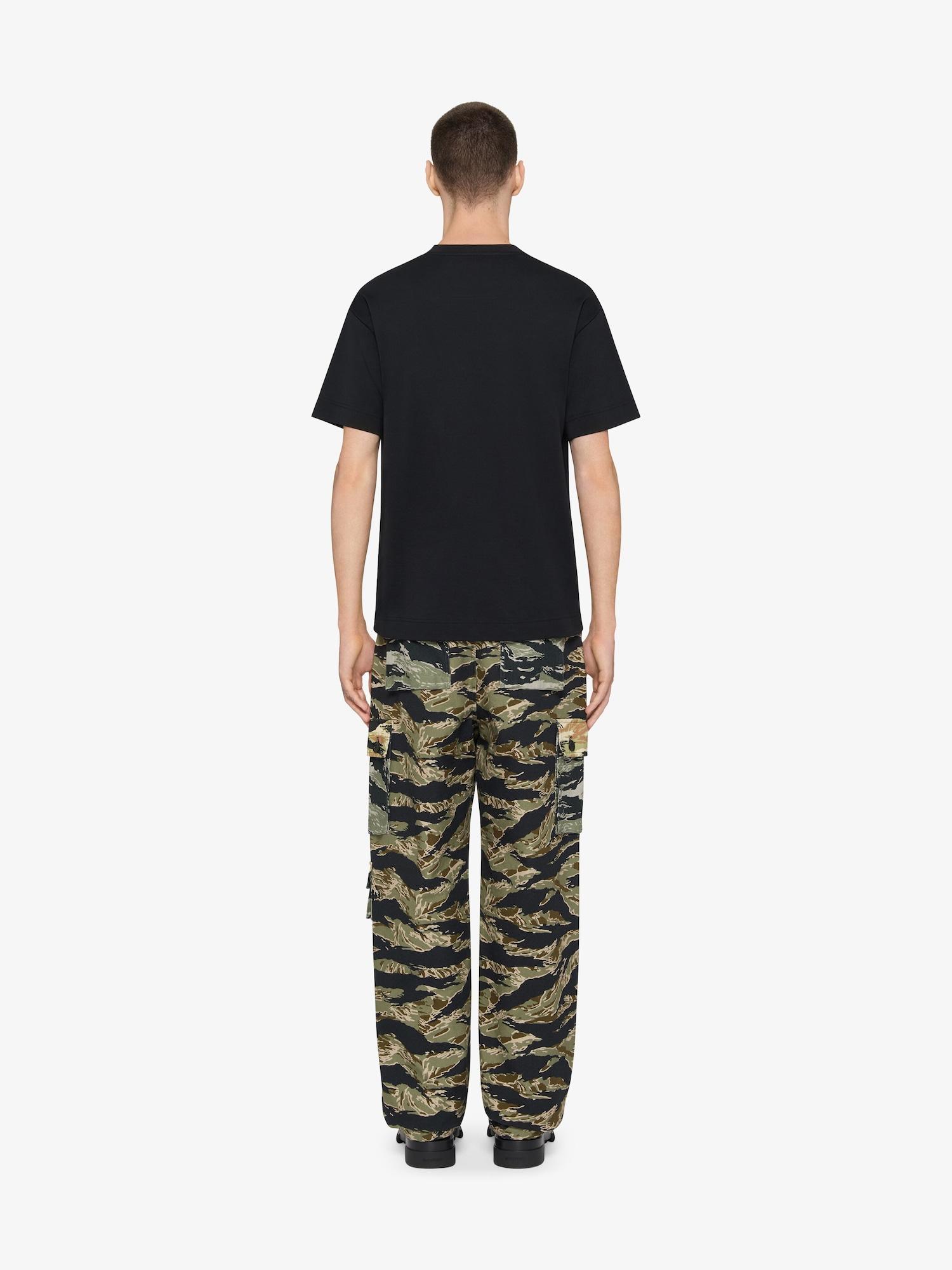 Cargo pants in cotton with camo print Product Image