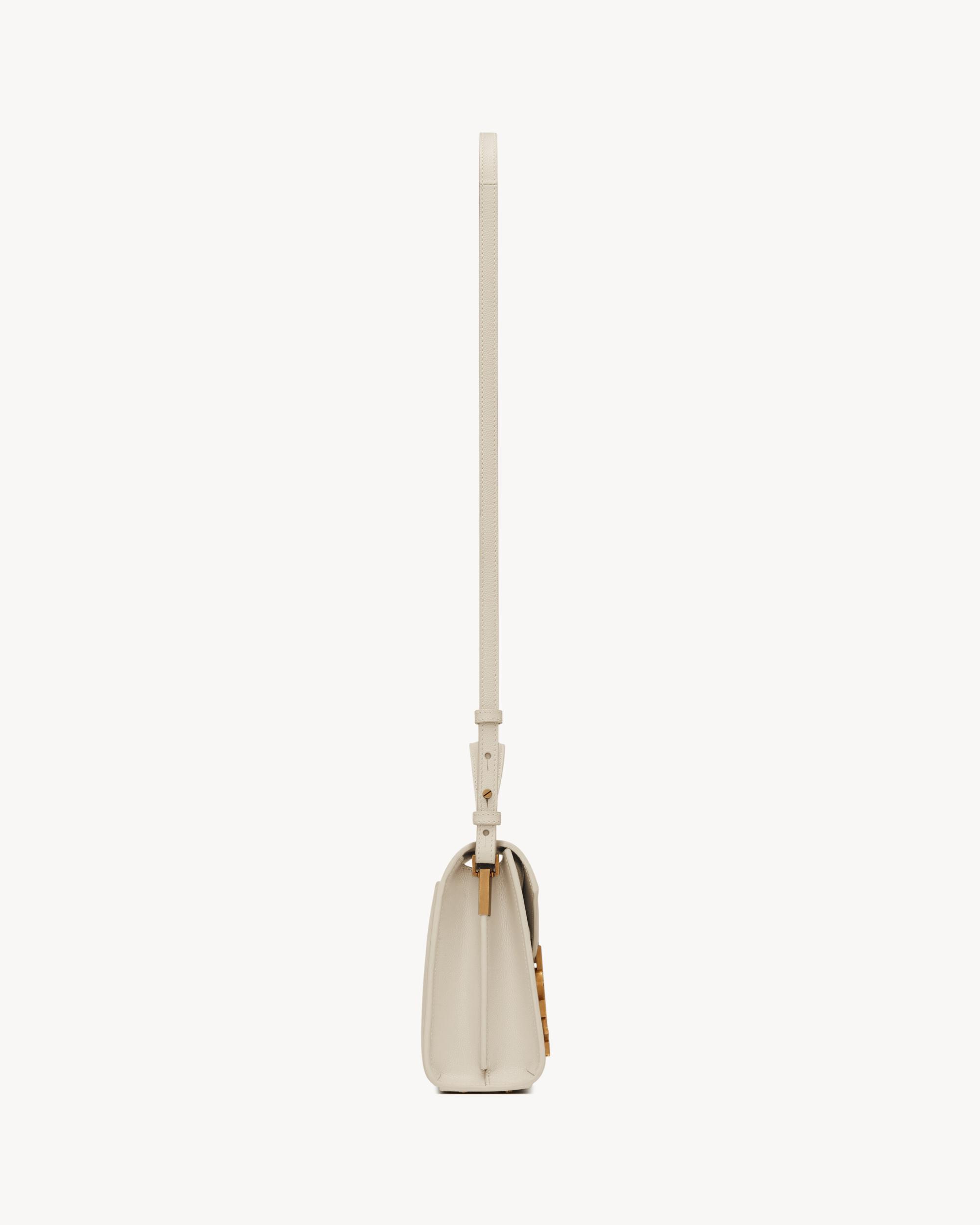 CASSANDRA Mini top handle bag in grain de poudre embossed leather Product Image