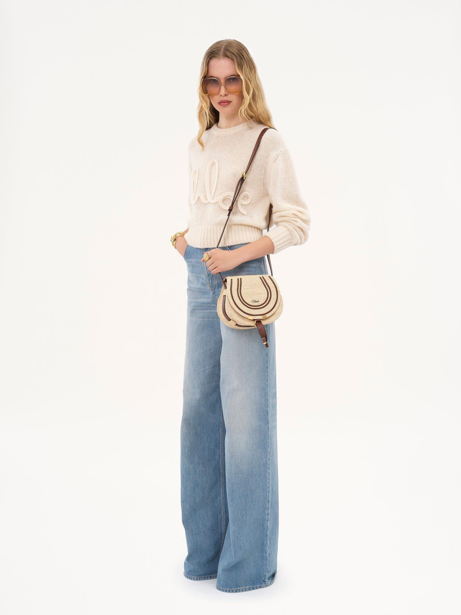 Small Marcie saddle bag in raffia-effect fibers  Product Image
