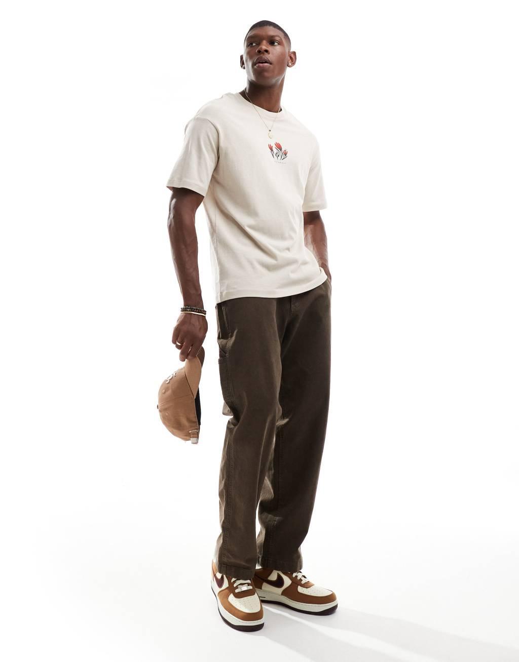Selected Homme oversized t-shirt with floral chest print in tan Product Image