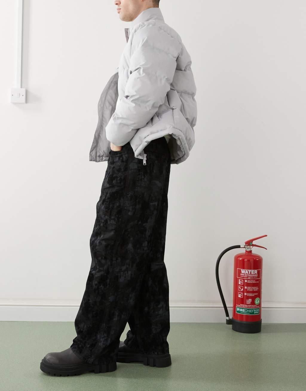 COLLUSION baggy jeans with flocked camo print in multi Product Image