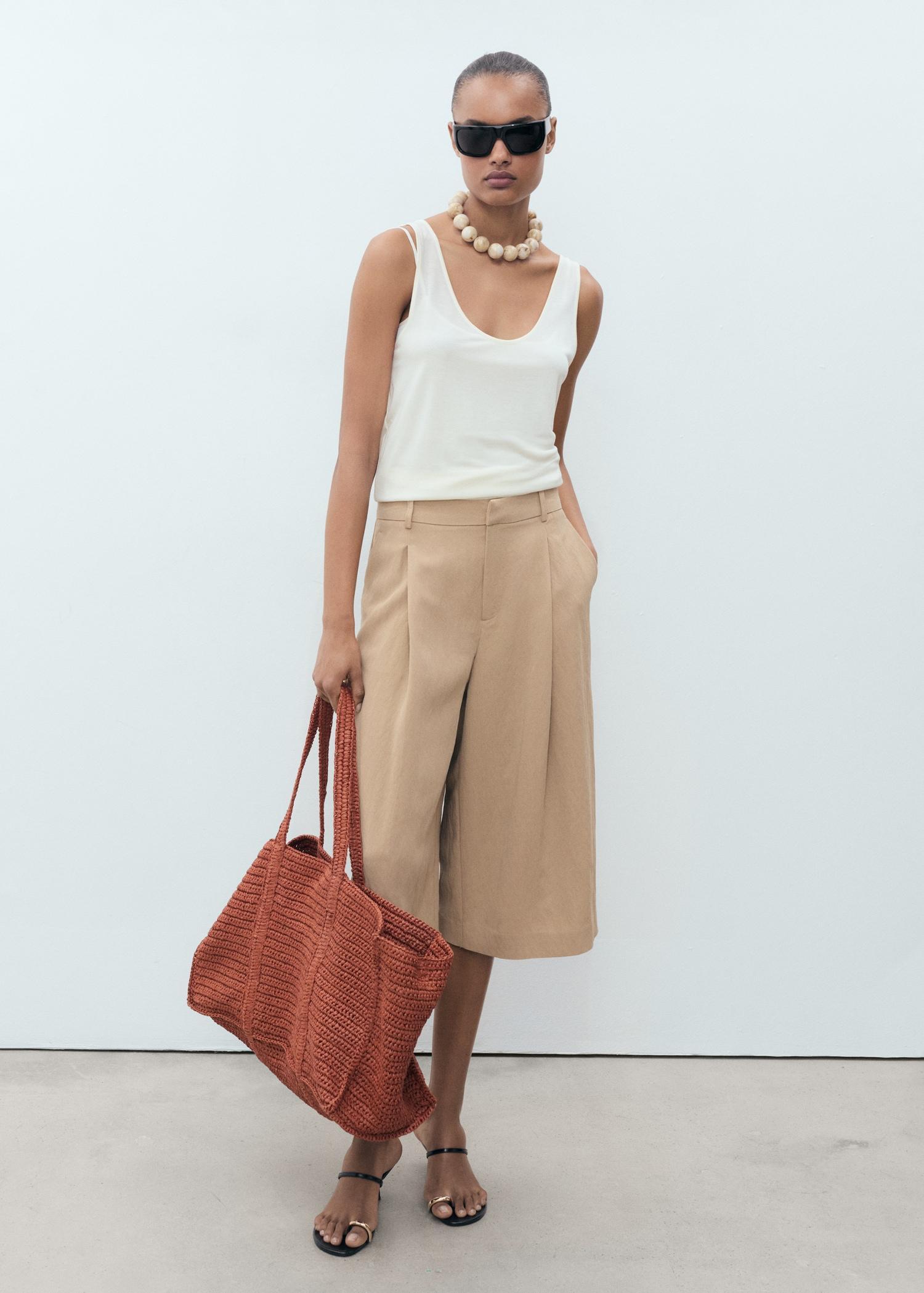 Lyocell pleated bermuda shorts - Women | MANGO USA Product Image