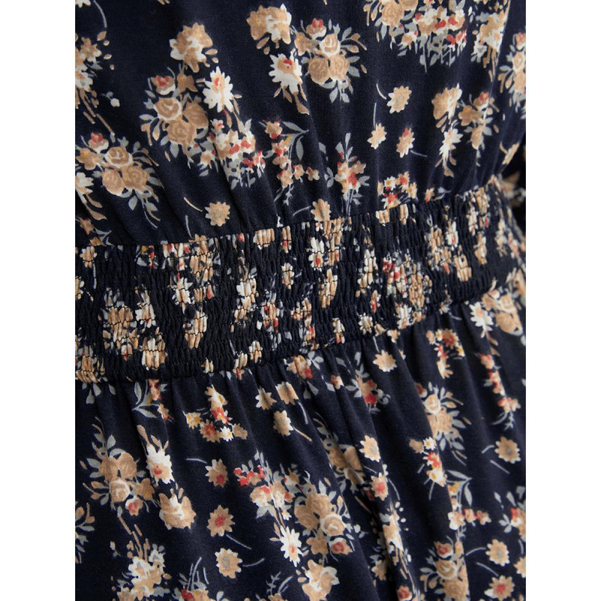 Plus Size Ditsy Floral Pocket Lantern Sleeve Shirred Flutter Dress Indigo Women Elegant Elastic Waist V-neck Long Sleeve Curvy Midi Dress BloomChic 12/L Product Image