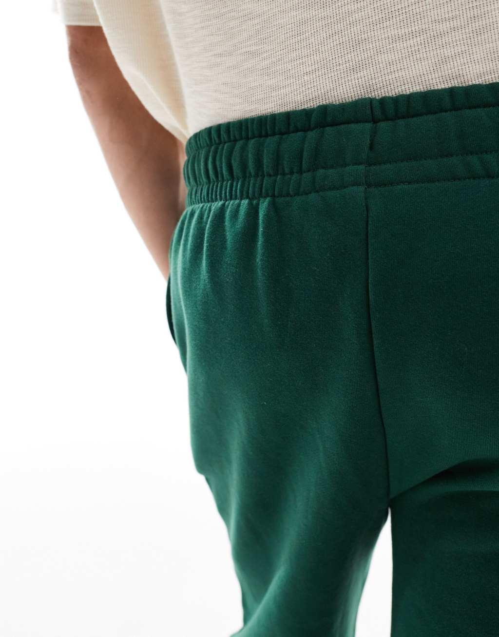 ASOS DESIGN premium heavyweight oversized sweatpants 400gsm in dark green Product Image