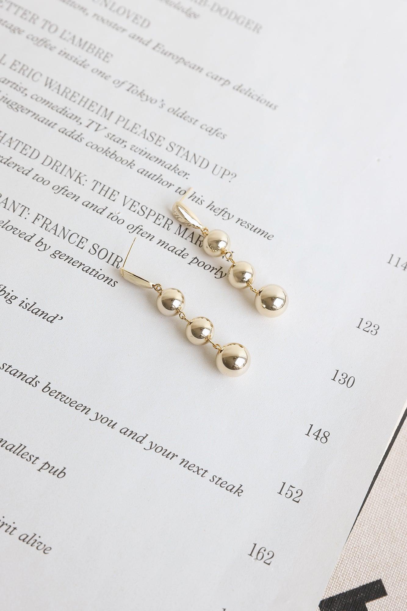 Flirty Fun Earrings Gold Product Image