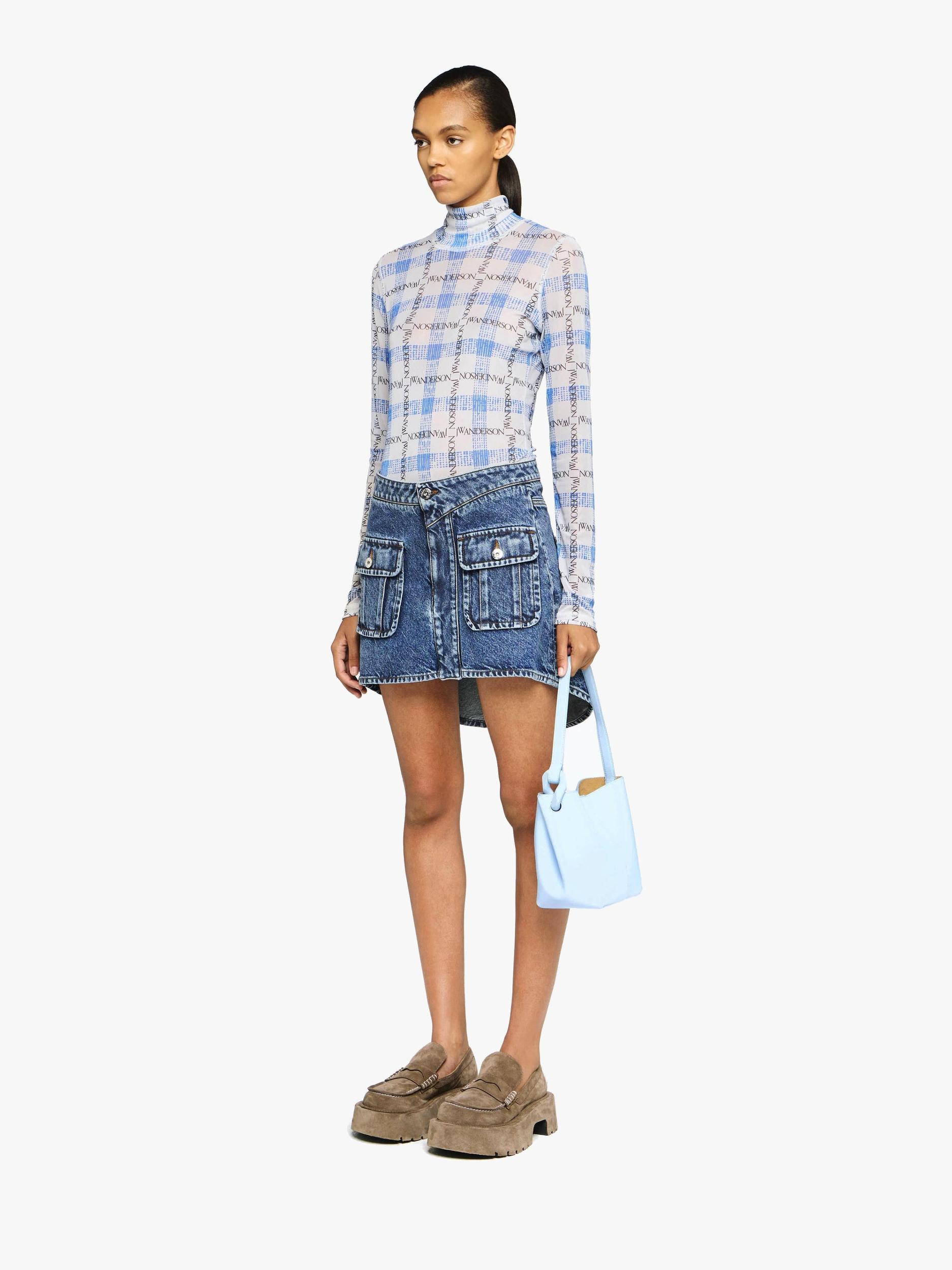 CURVED PATCH POCKET MINI SKIRT Product Image