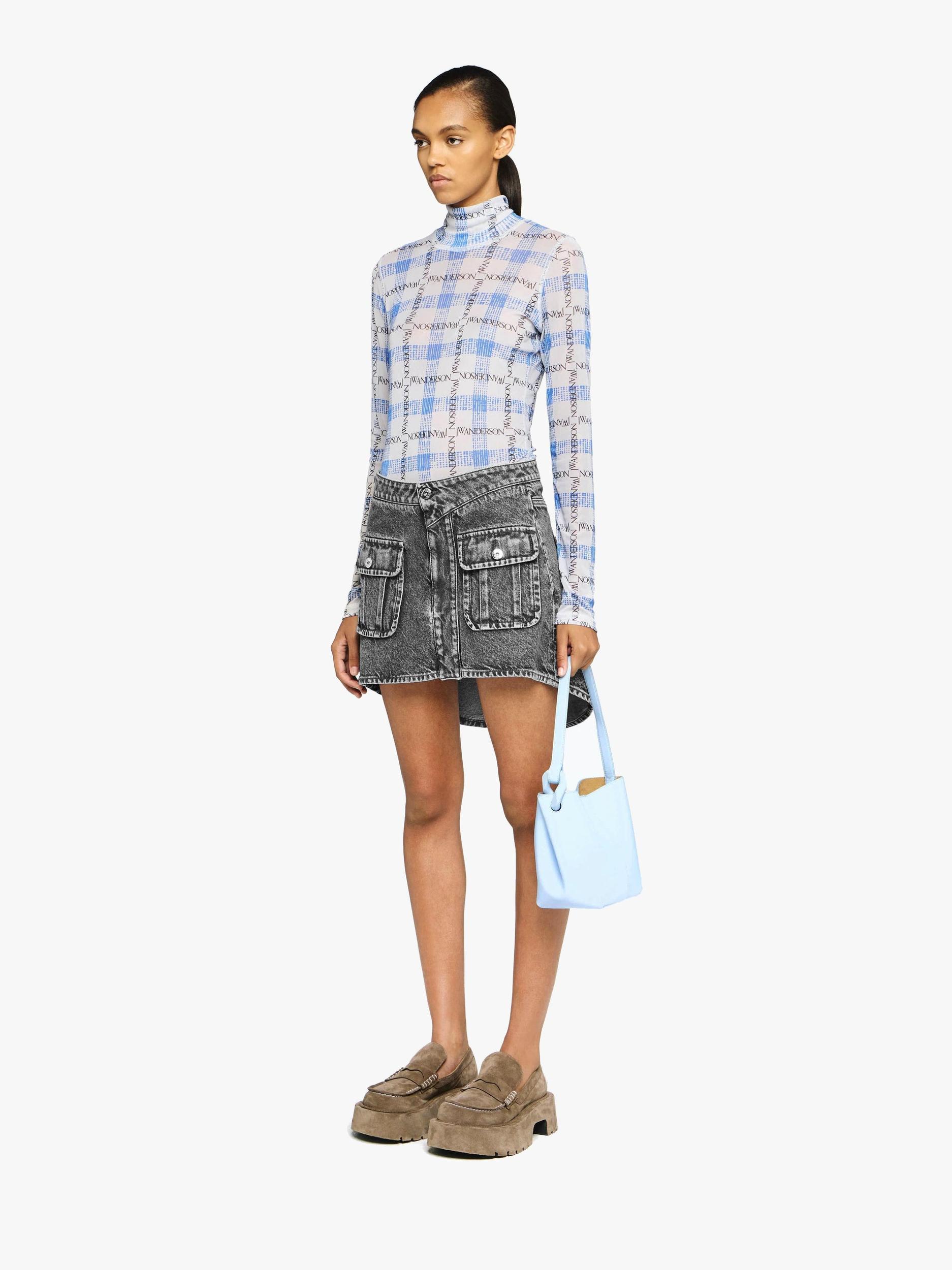 CURVED PATCH POCKET MINI SKIRT Product Image