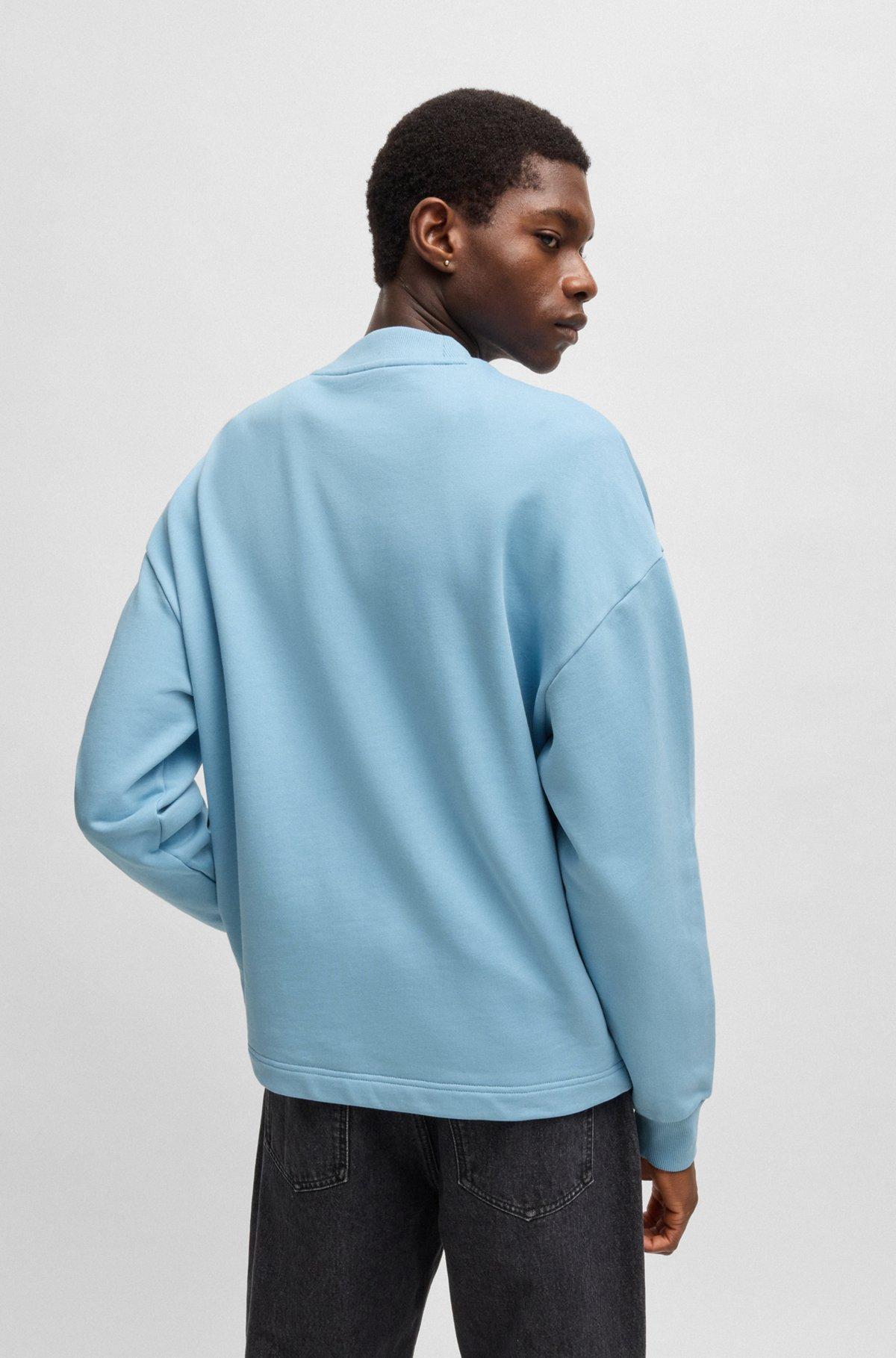 Cotton-terry sweatshirt with Happy HUGO logo patch Product Image