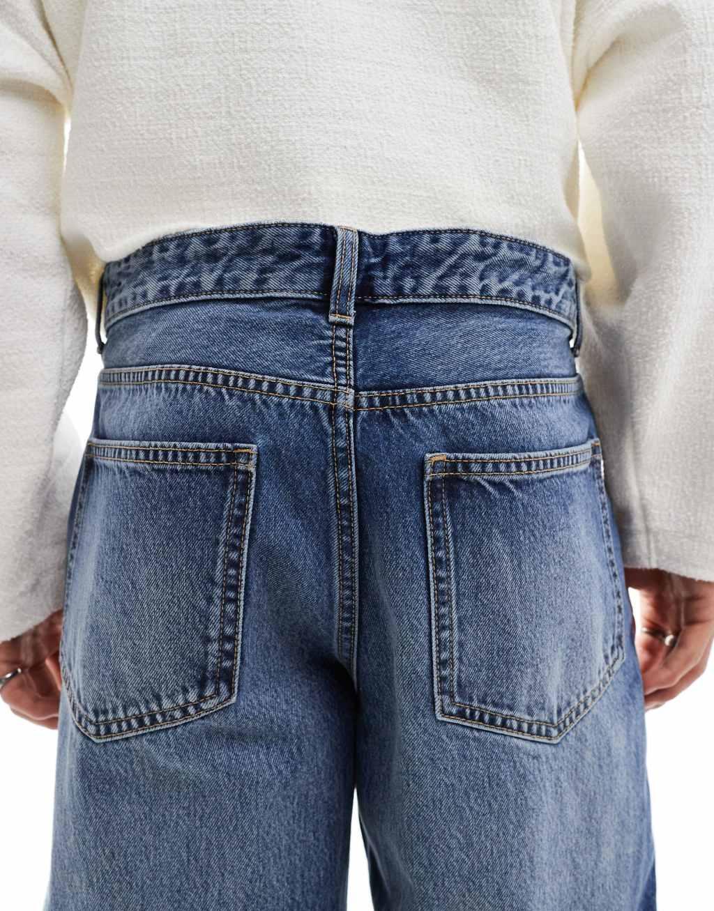 Bershka washed horseshoe jeans in blue  Product Image