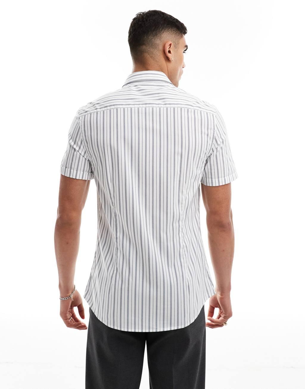 ASOS DESIGN stretch slim fit striped work shirt with roll sleeves in black and white Product Image