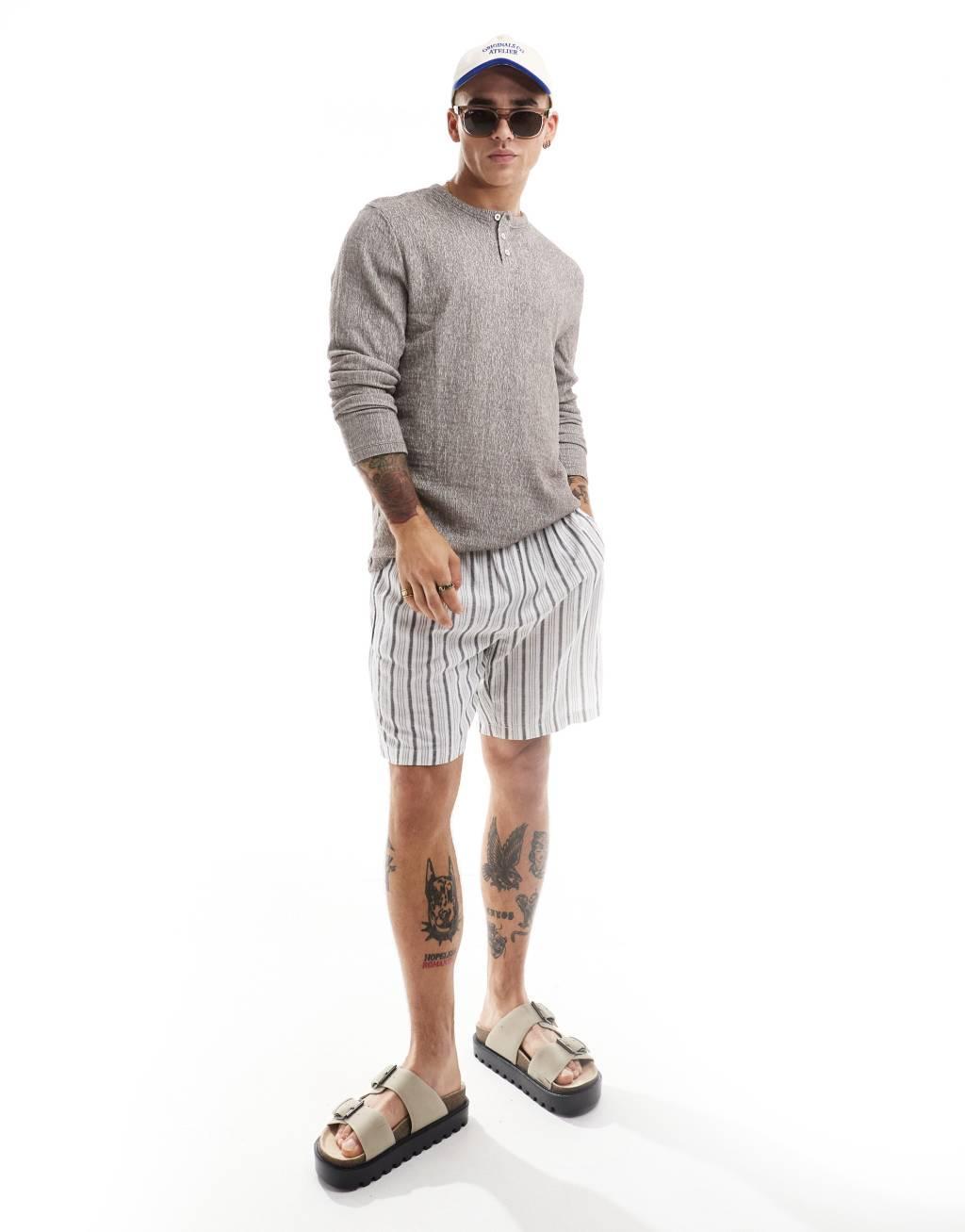 ASOS DESIGN standard long sleeve t-shirt with henley neckline in crinkle Product Image