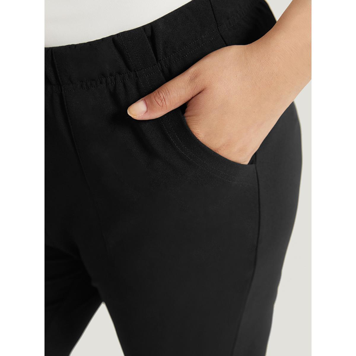 Plus Size Solid Pocket Flare Leg Elastic Waist Pants Women Black At the Office Flare Leg High Rise Work Pants BloomChic 18-20/2X Product Image