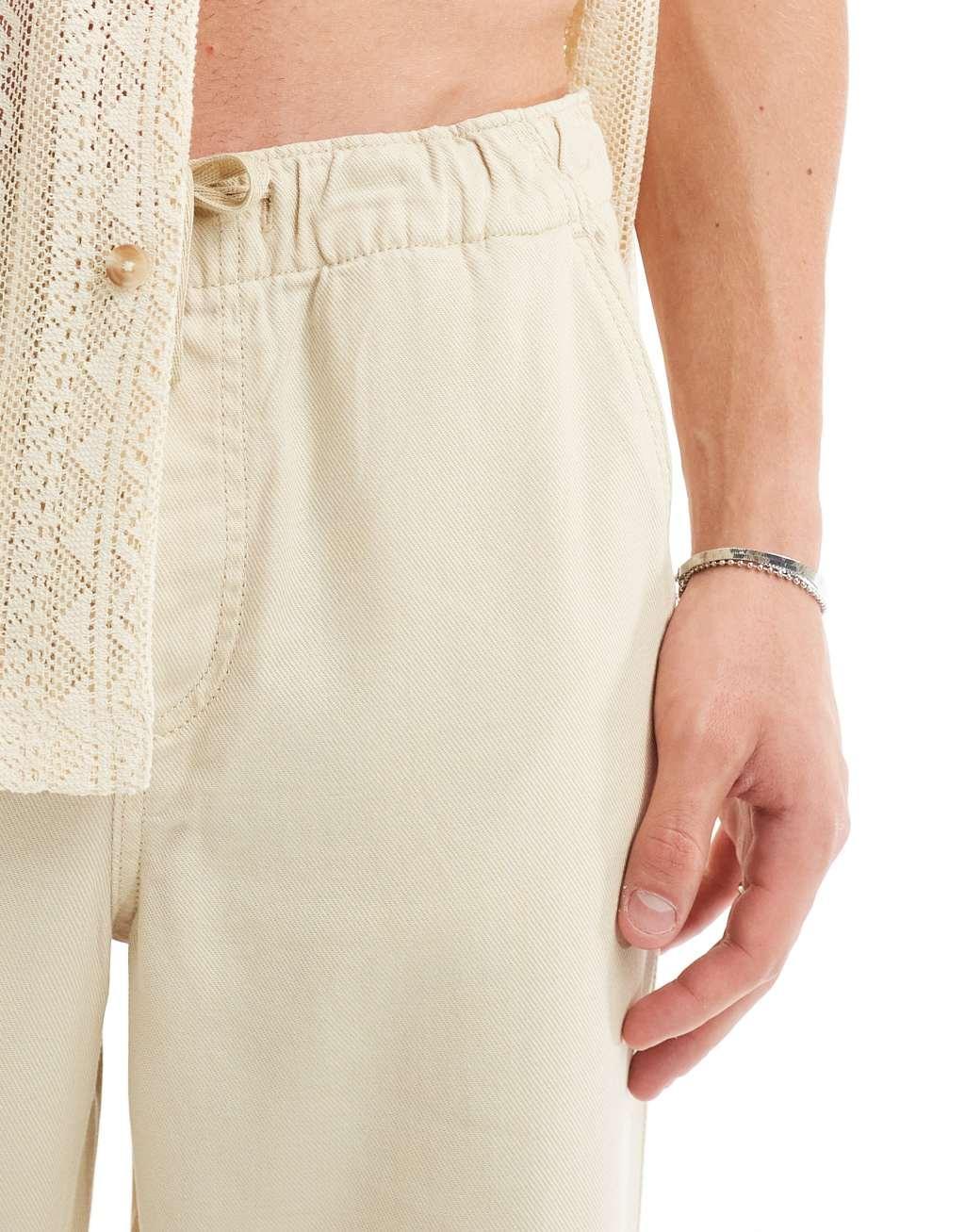 Selected Homme linen mix loose fit pants in beige Product Image