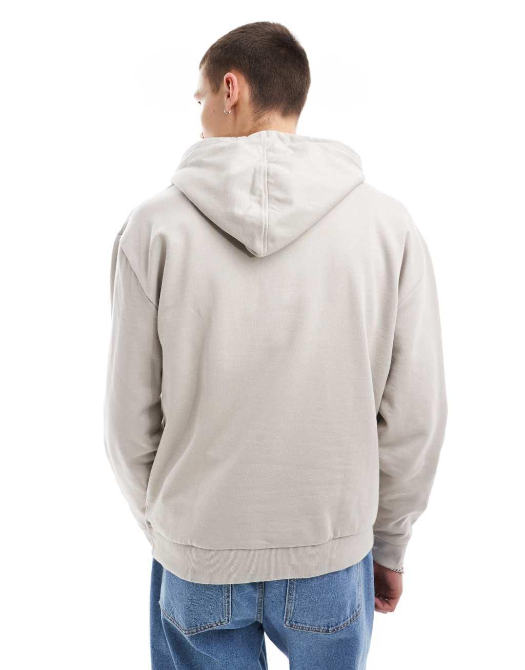 ASOS DESIGN oversized hoodie with nylon pocket in beige Product Image