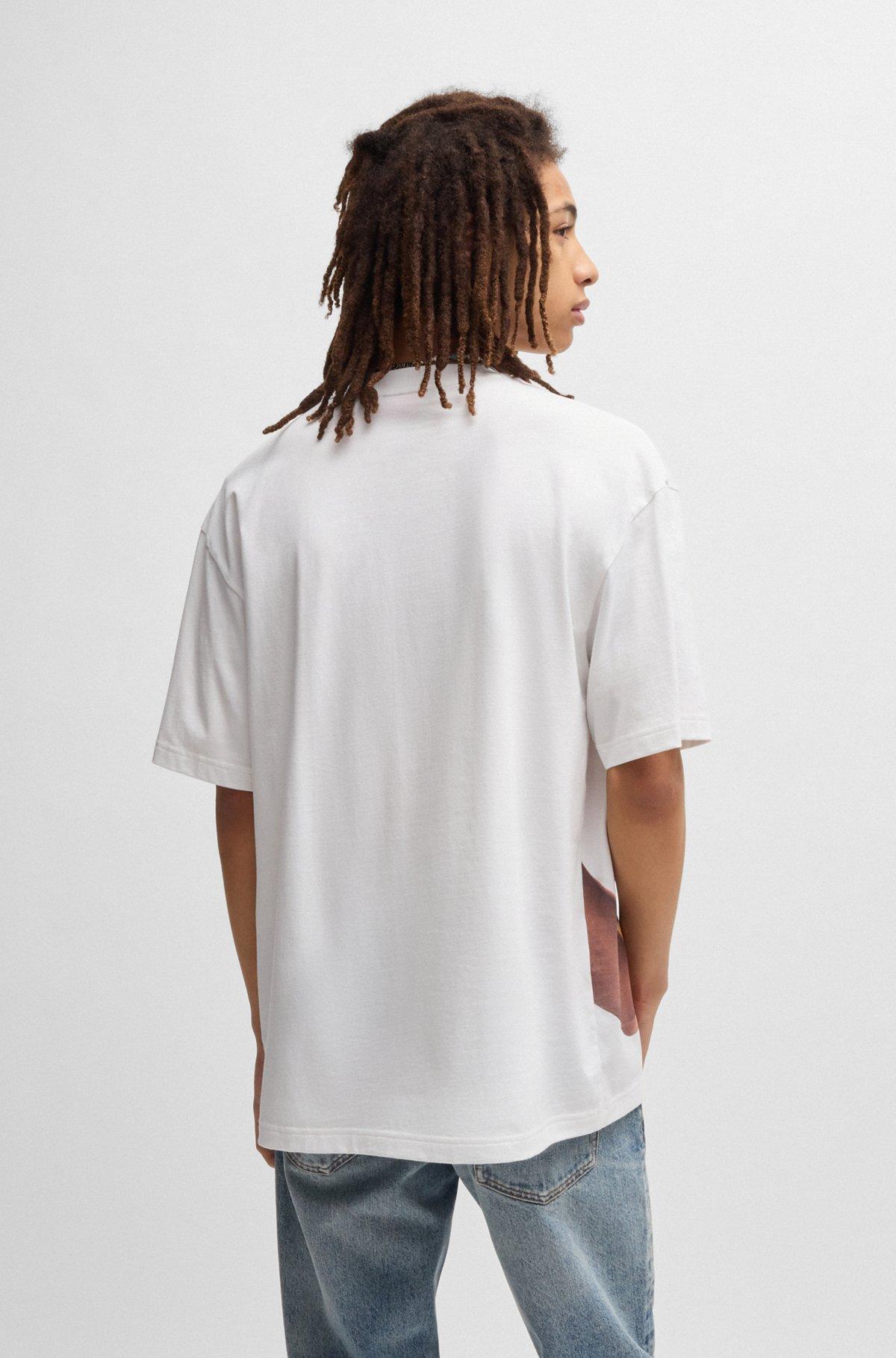 HUGO - Oversize-fit T-shirt in cotton with high-impact print - White Product Image