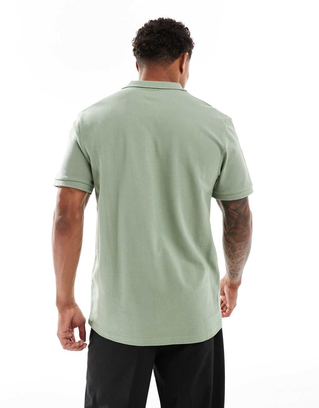 ASOS DESIGN pique polo in mid green Product Image