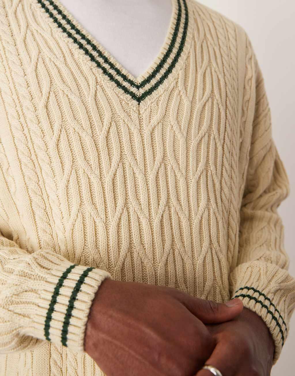 ASOS DESIGN oversized cable knit cricket sweater in cream with green tipping Product Image