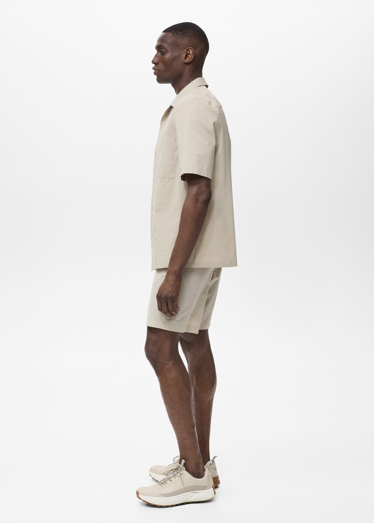 Regular-fit shirt with chest pocket - Men | MANGO USA Product Image