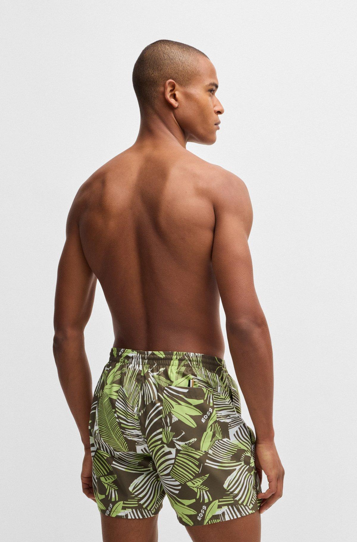 Fully lined swim shorts with seasonal print Product Image