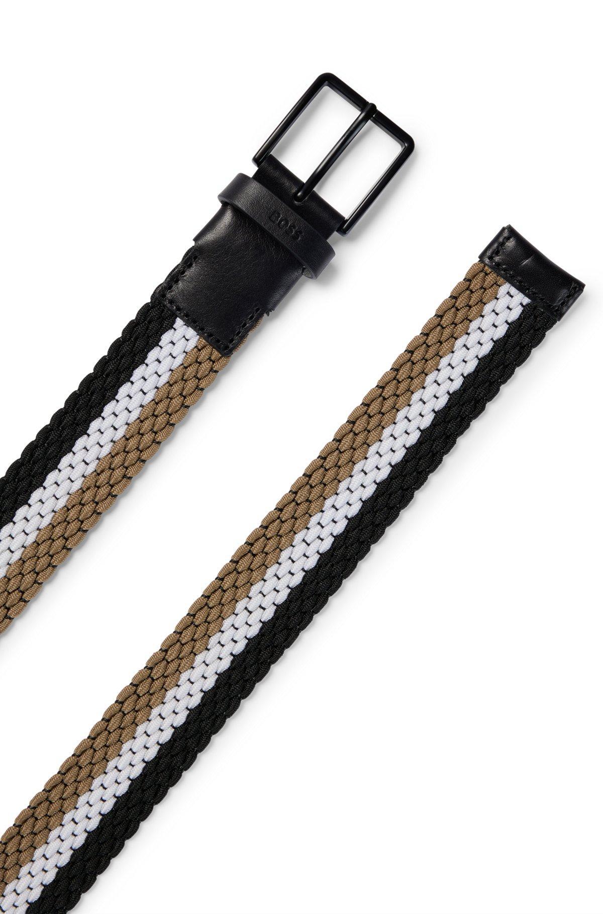Woven belt with leather trims and contrasting color detail Product Image