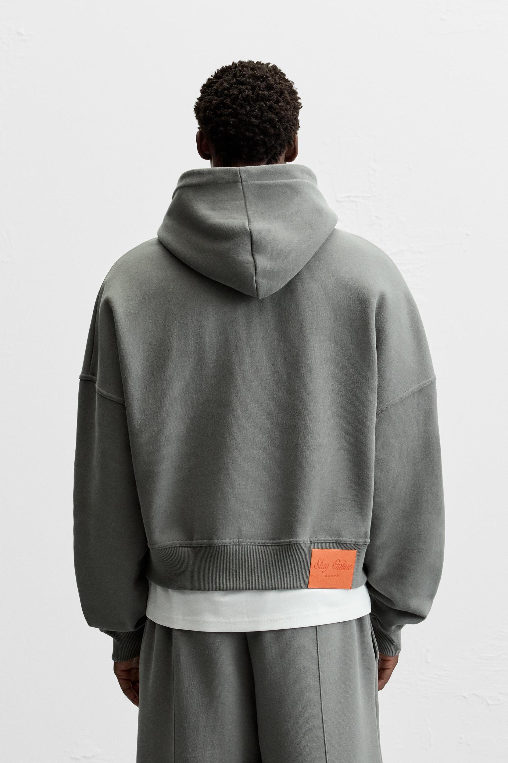 BOXY FIT PATCH SWEATSHIRT Product Image