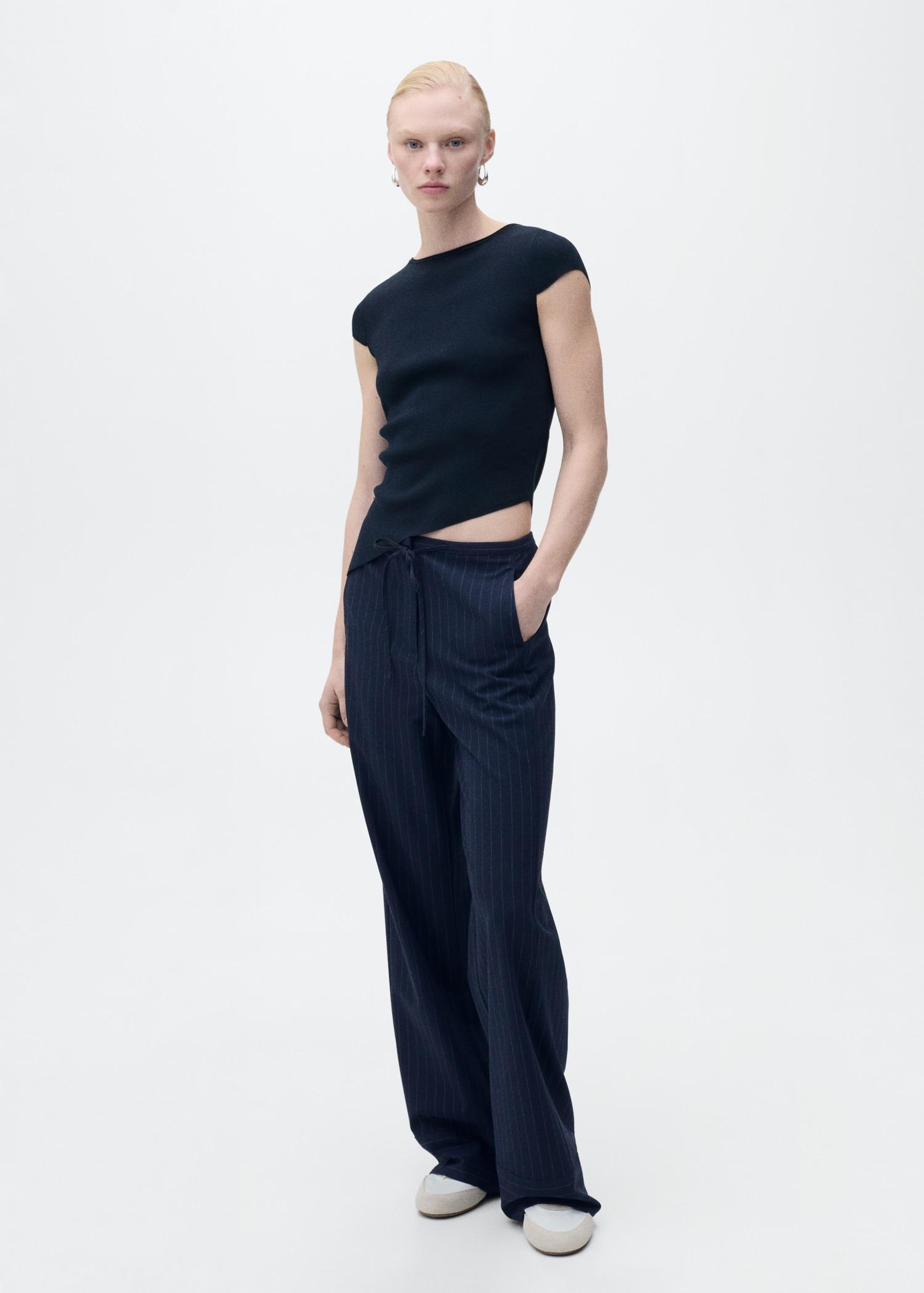 Knitted sweater with asymmetrical hem - Women | MANGO USA Product Image