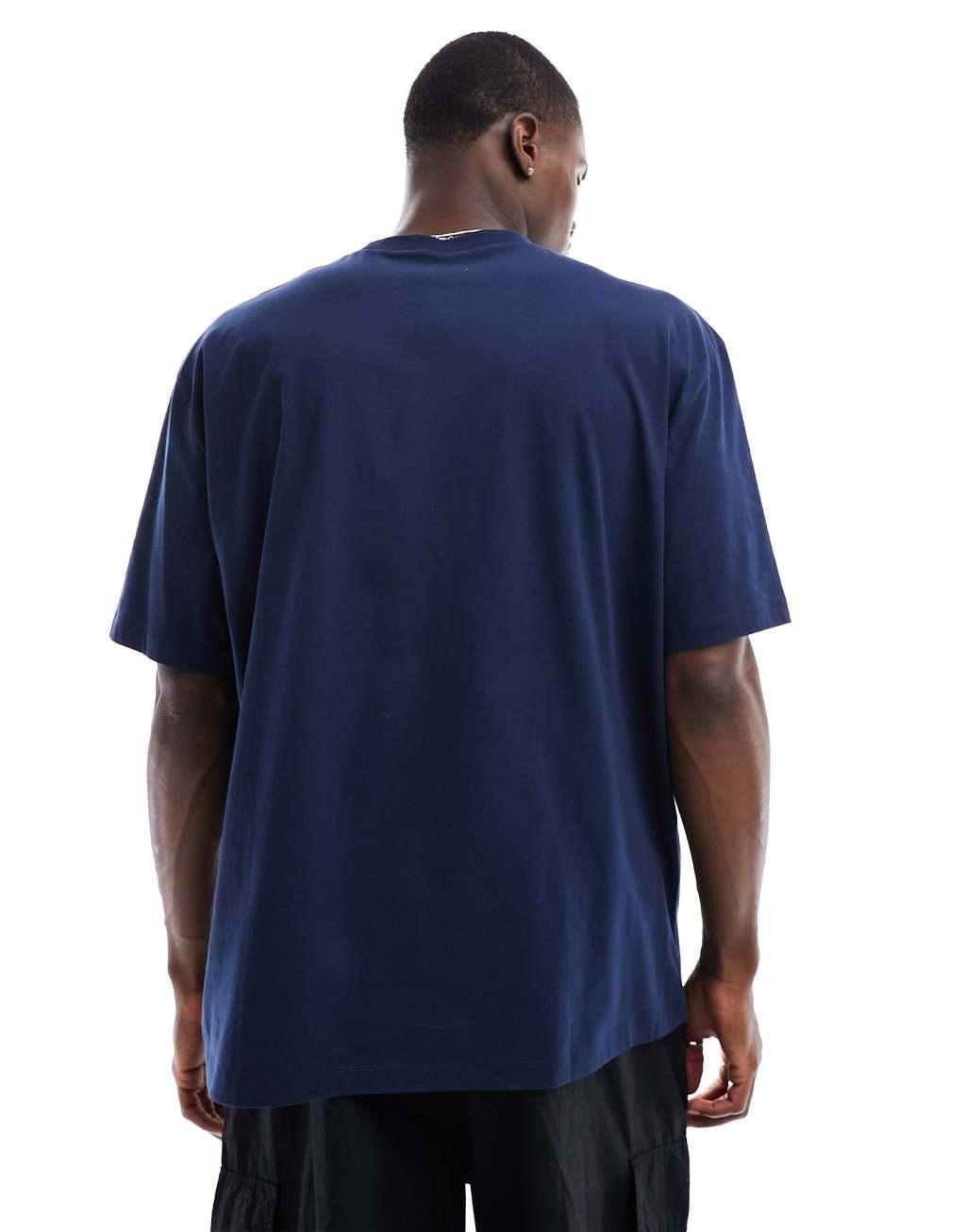 ASOS DESIGN oversized t-shirt in dark blue with city chest print Product Image