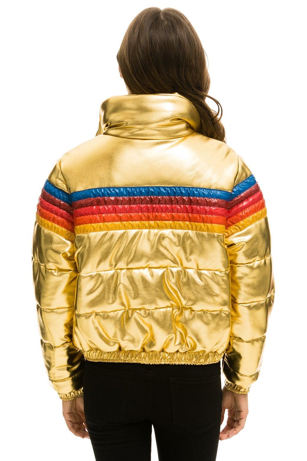 5 STRIPE LUXE APRES PUFFER JACKET - GLOSSY GOLD Female Product Image