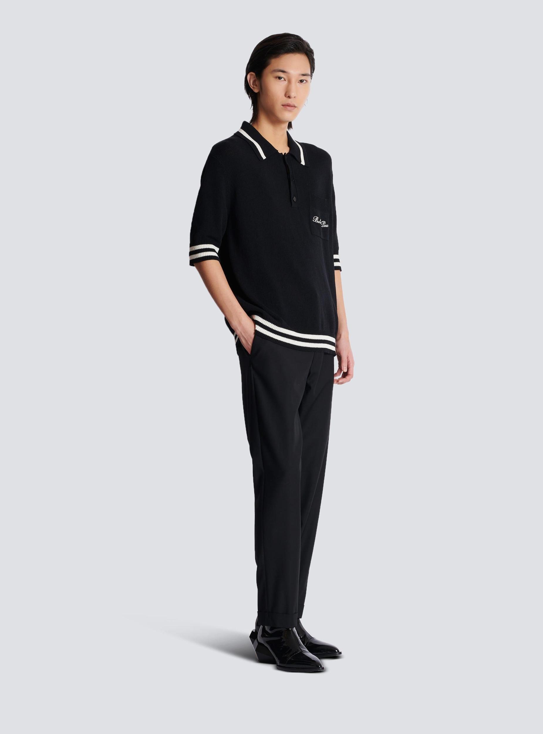Wool polo shirt with Balmain Signature embroidery Product Image