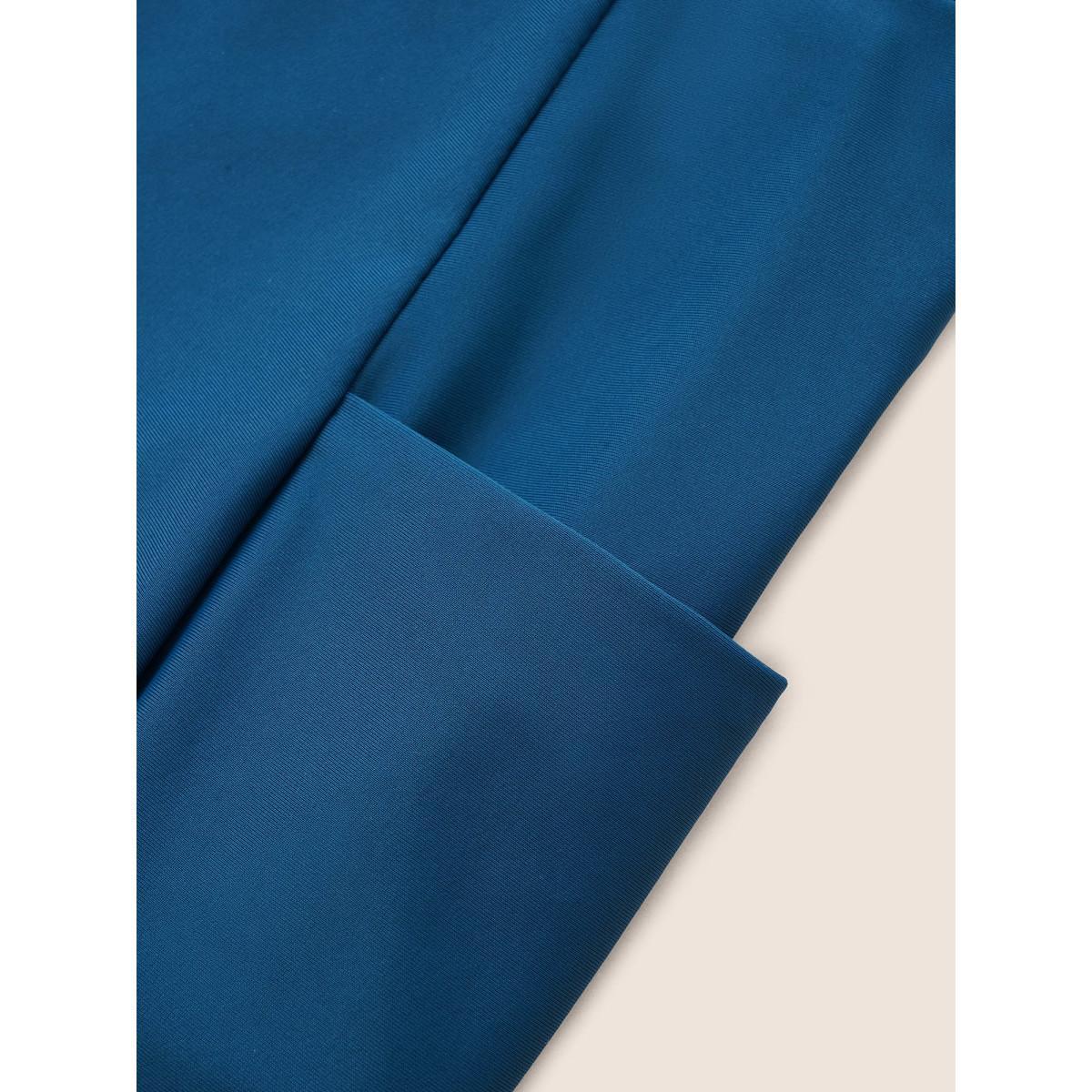 Plus Size Solid Patched Pocket Side Pleated Swim Skirt Women's Swimwear Indigo Beach Non High stretch Bodycon High Rise Slanted pocket Curve Swim Bottoms BloomChic 10/M Product Image