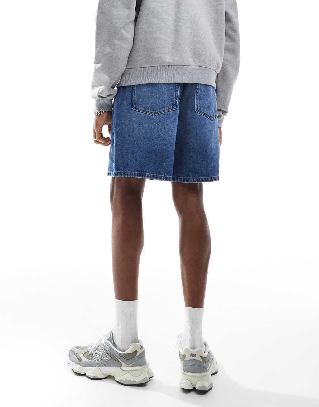 ASOS DESIGN standard length jort in mid wash blue Product Image