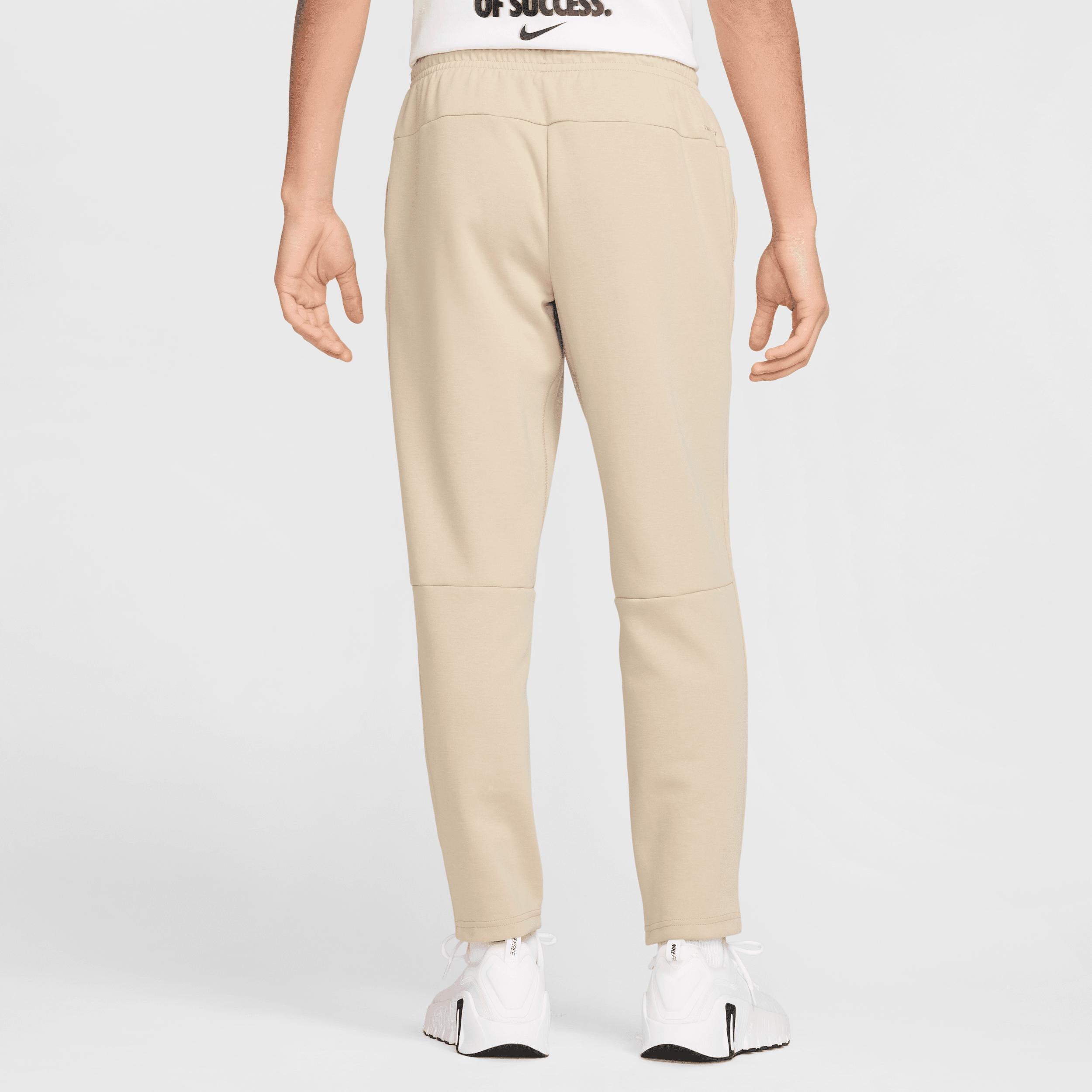 Nike Men's Primary Fleece Dri-FIT UV Tapered Performance Pants Product Image