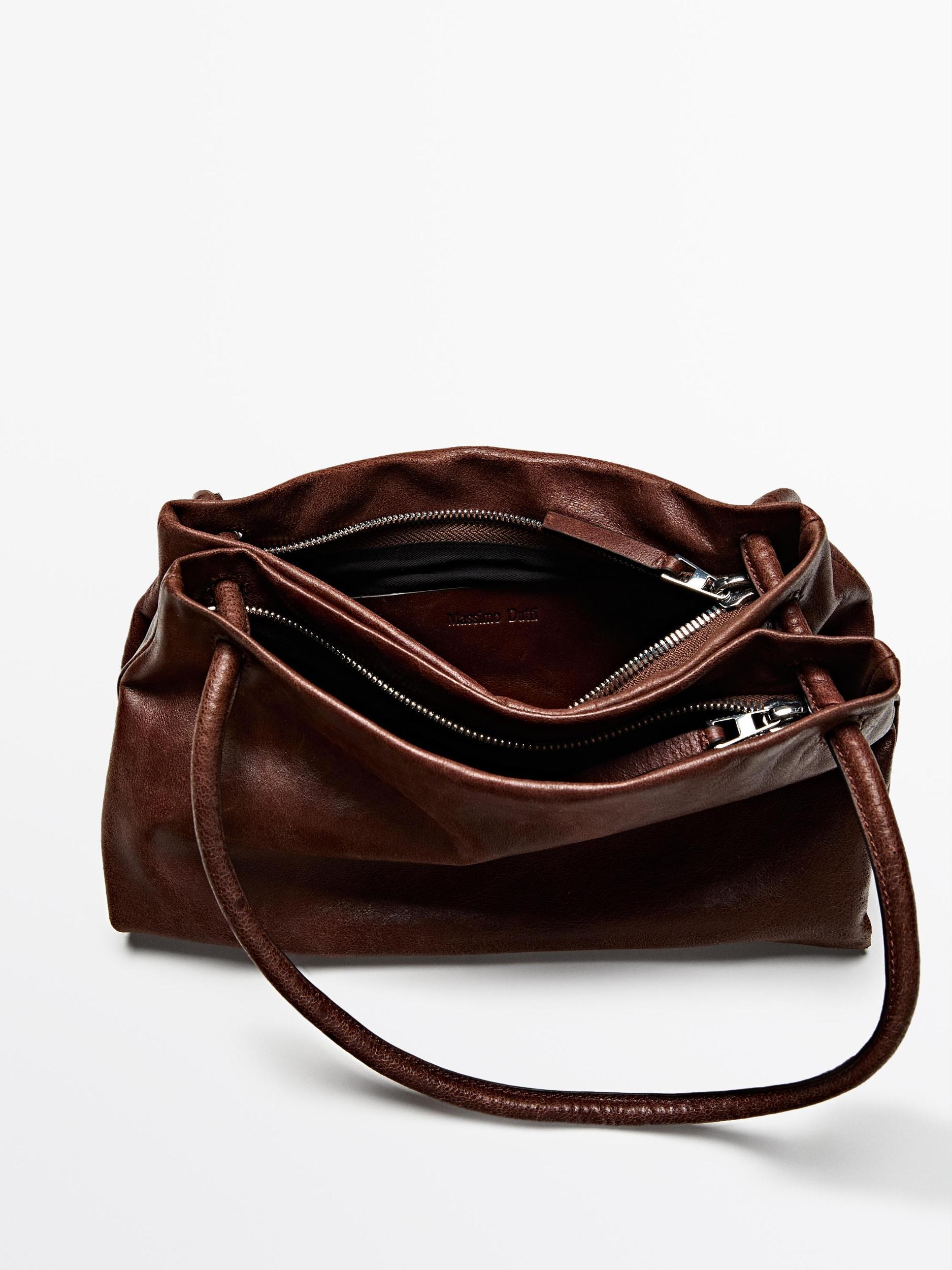 Small nappa leather bag with compartments Product Image