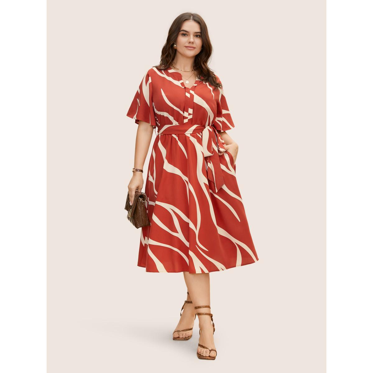 Plus Size Geometric Surplice Neck Tie Knot Midi Dress Rust Women At the Office Belted Flat collar with V-notch Short sleeve Curvy BloomChic 14-16/1X Product Image
