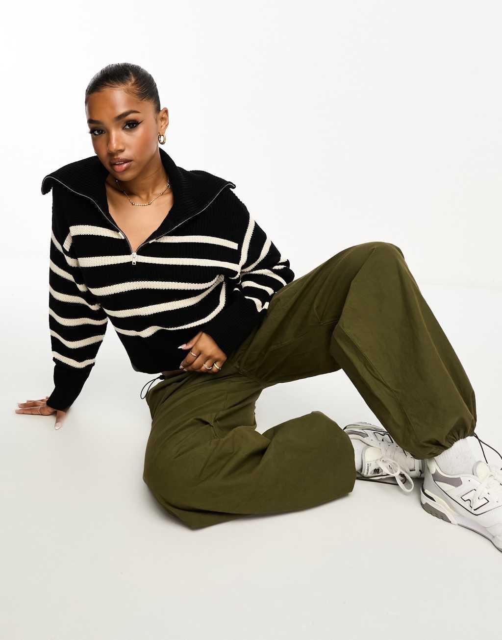 Monki high zip neck knit sweater in black and white stripe Product Image