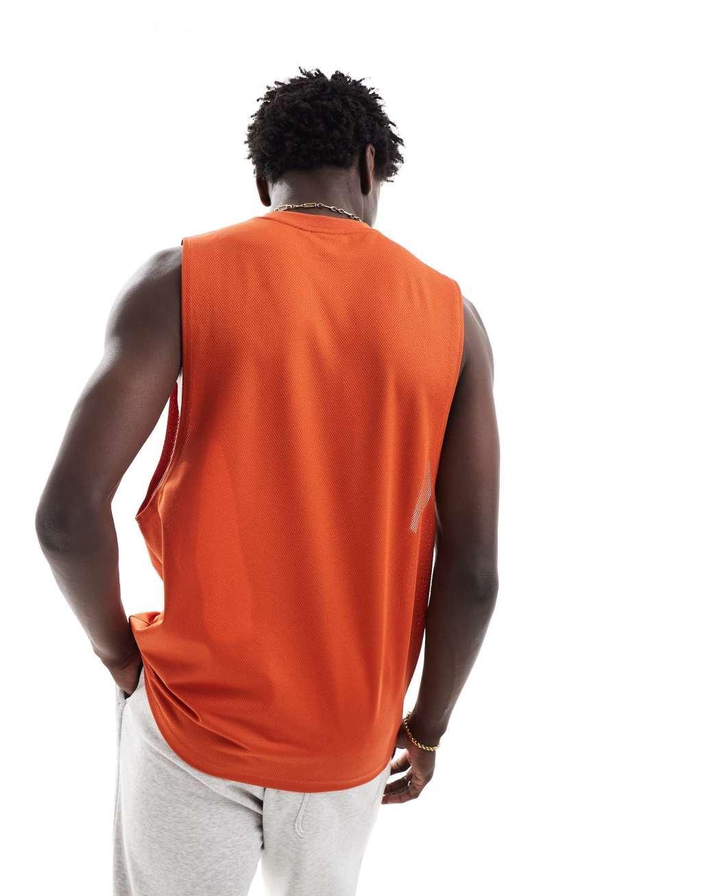 ASOS DESIGN relaxed tank top in orange sporty mesh Product Image