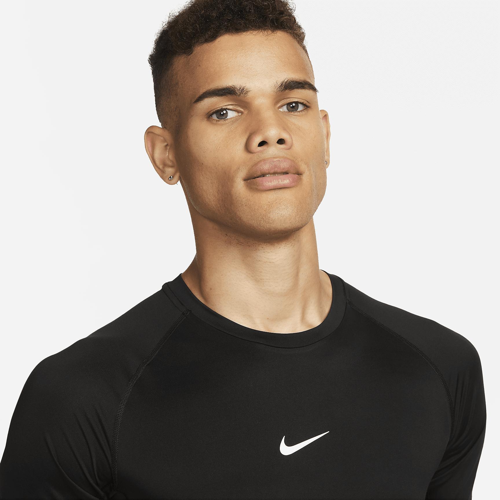 Nike Mens Pro Dri-FIT Tight Short-Sleeve Fitness Top in Black/White Product Image