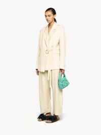 SMALL CABLE KNIT BAG - LEATHER DRAWCORD TOP HANDLE BAG in green | JW Anderson US  Product Image