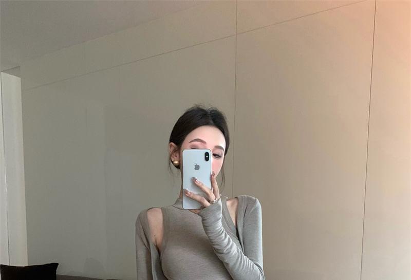 Set: Long-Sleeve Cutout Plain Crop Top + High Waist Maxi Skirt Product Image