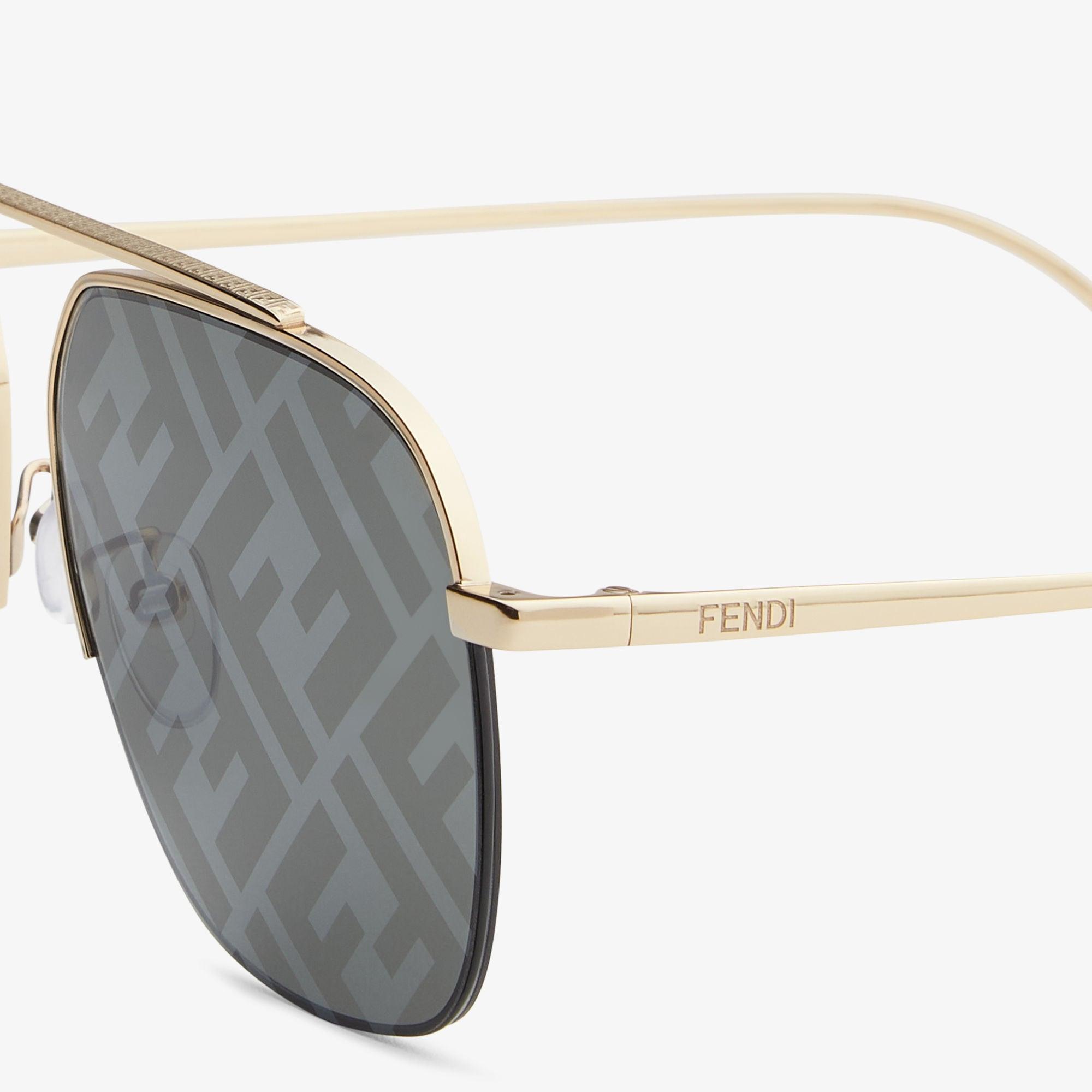 Fendi TravelGold-colored sunglasses Product Image