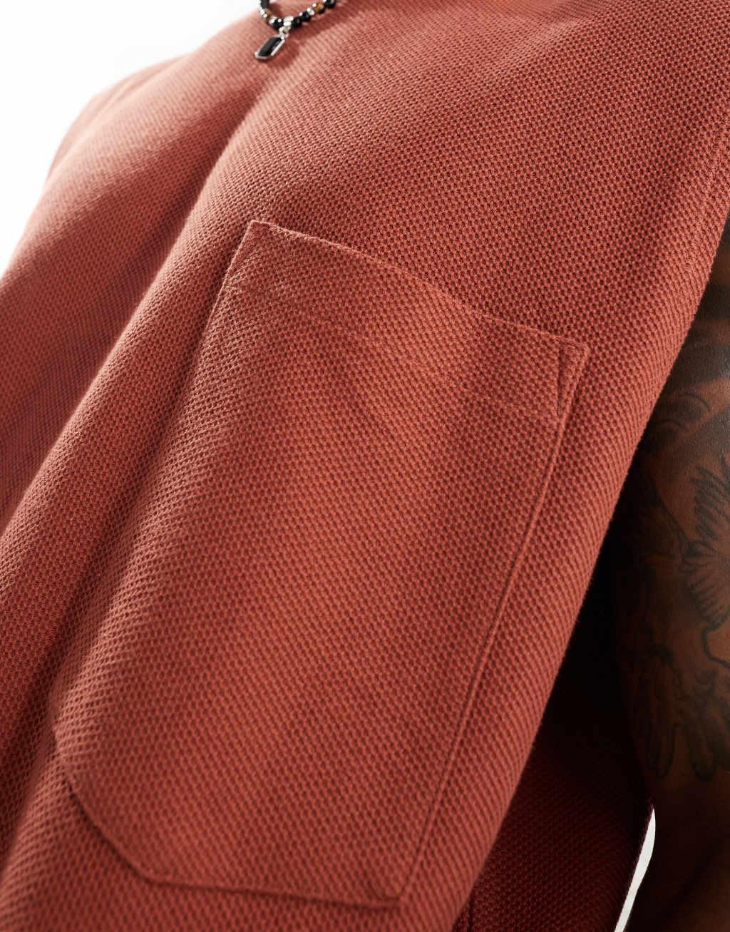 ASOS DESIGN oversized tank with front pocket in red Product Image