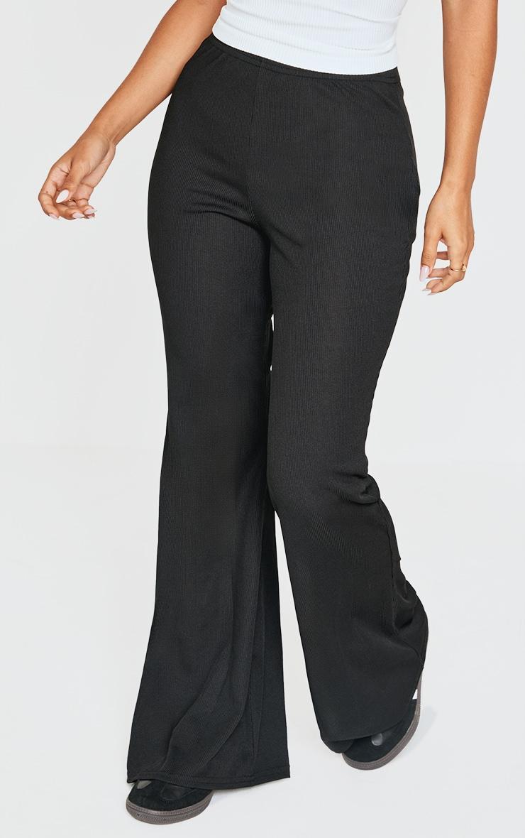 Petite Black Ribbed Flared Pants Product Image