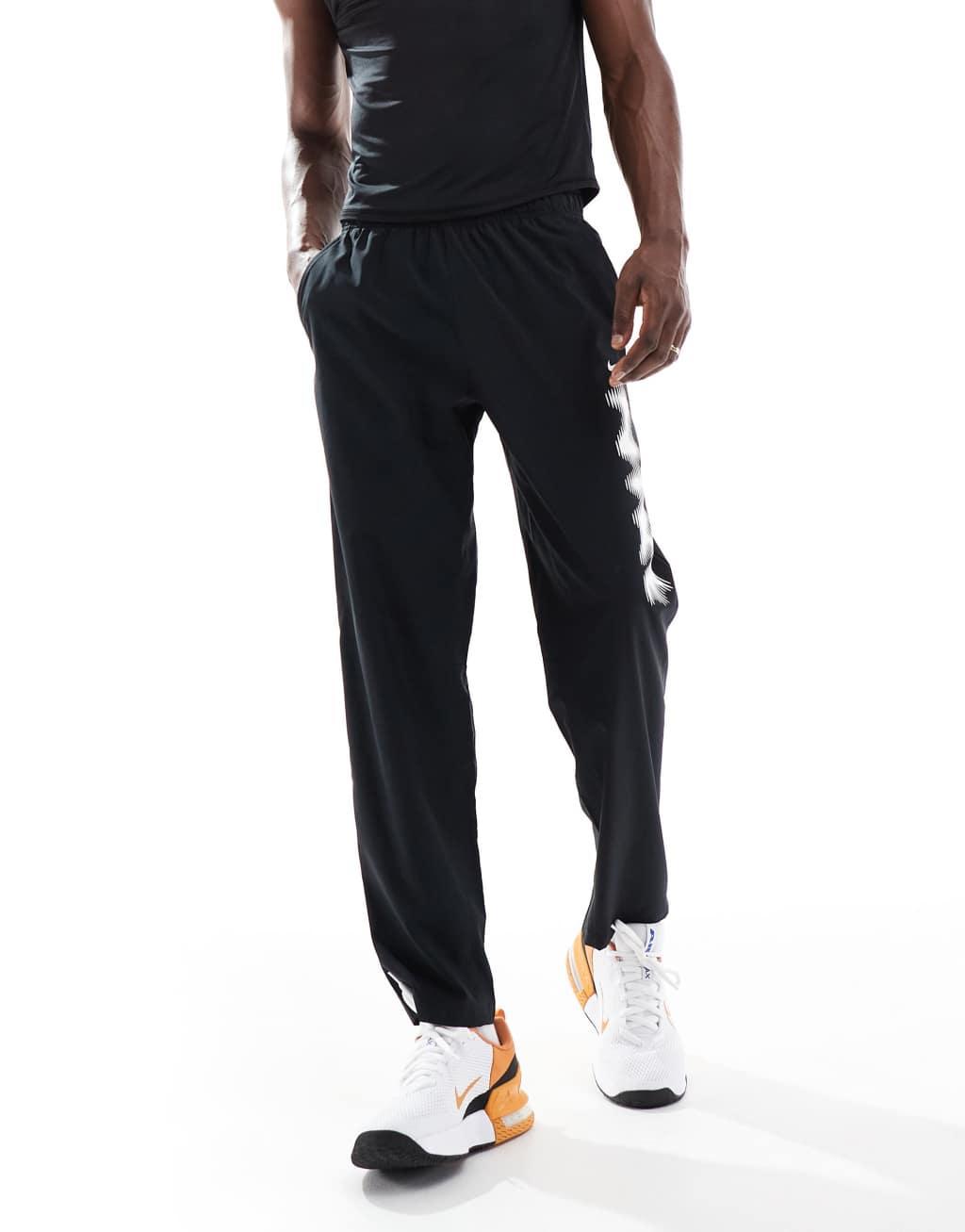 Nike Training blurred swoosh graphic sweatpants in black Product Image