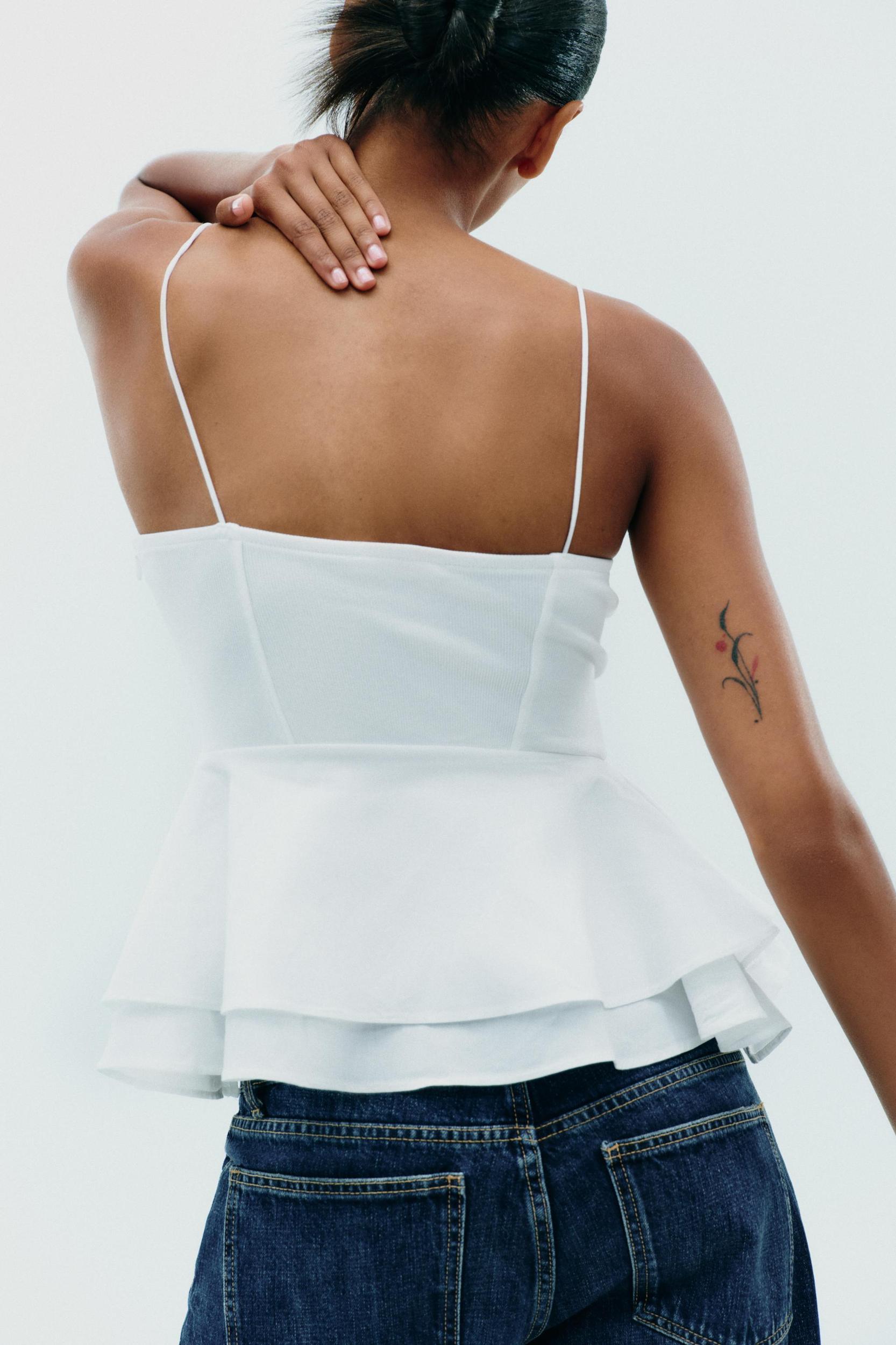 PEPLUM MIXED TOP Product Image