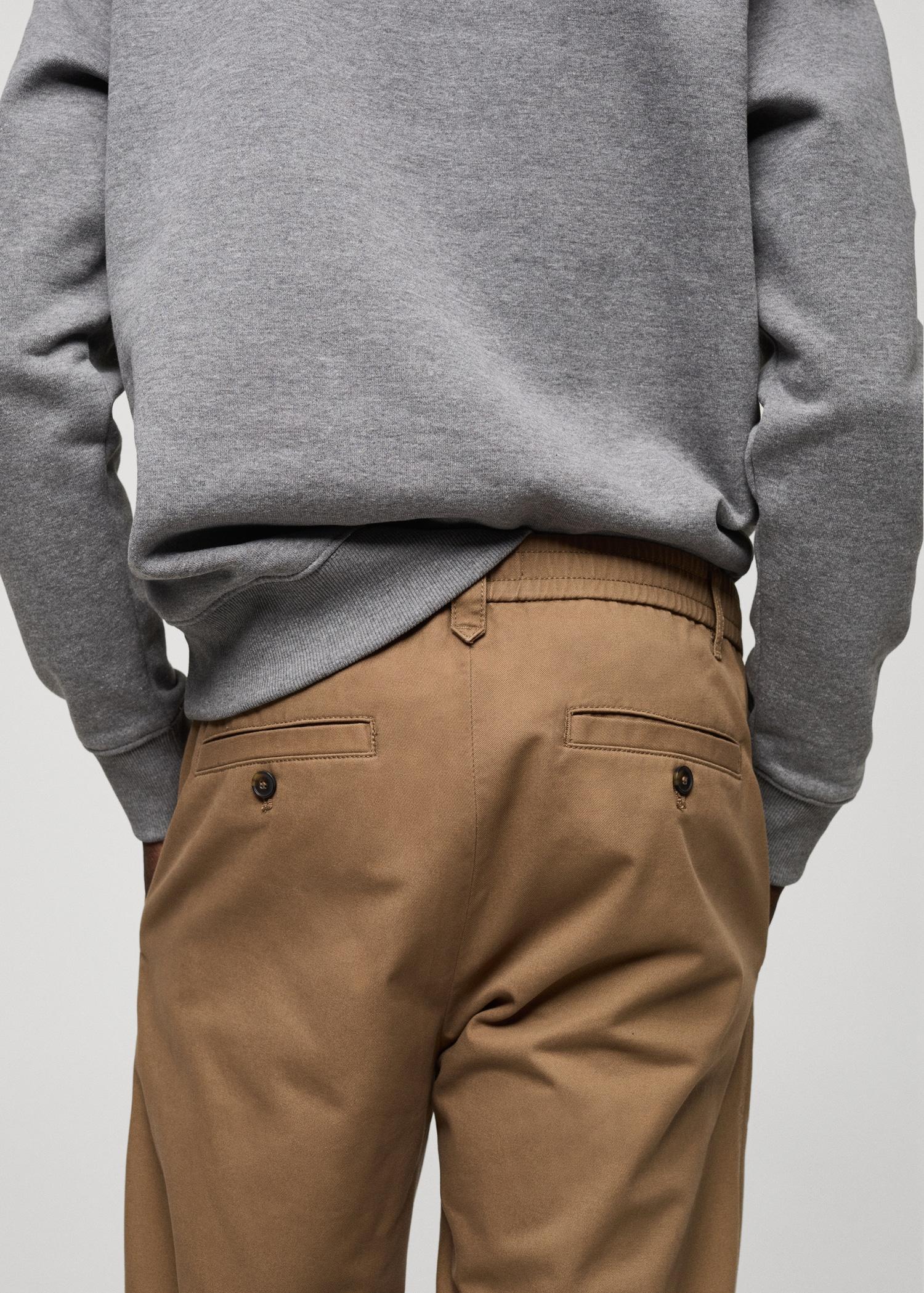 Regular-fit cotton pants with drawstring - Men | MANGO USA Product Image