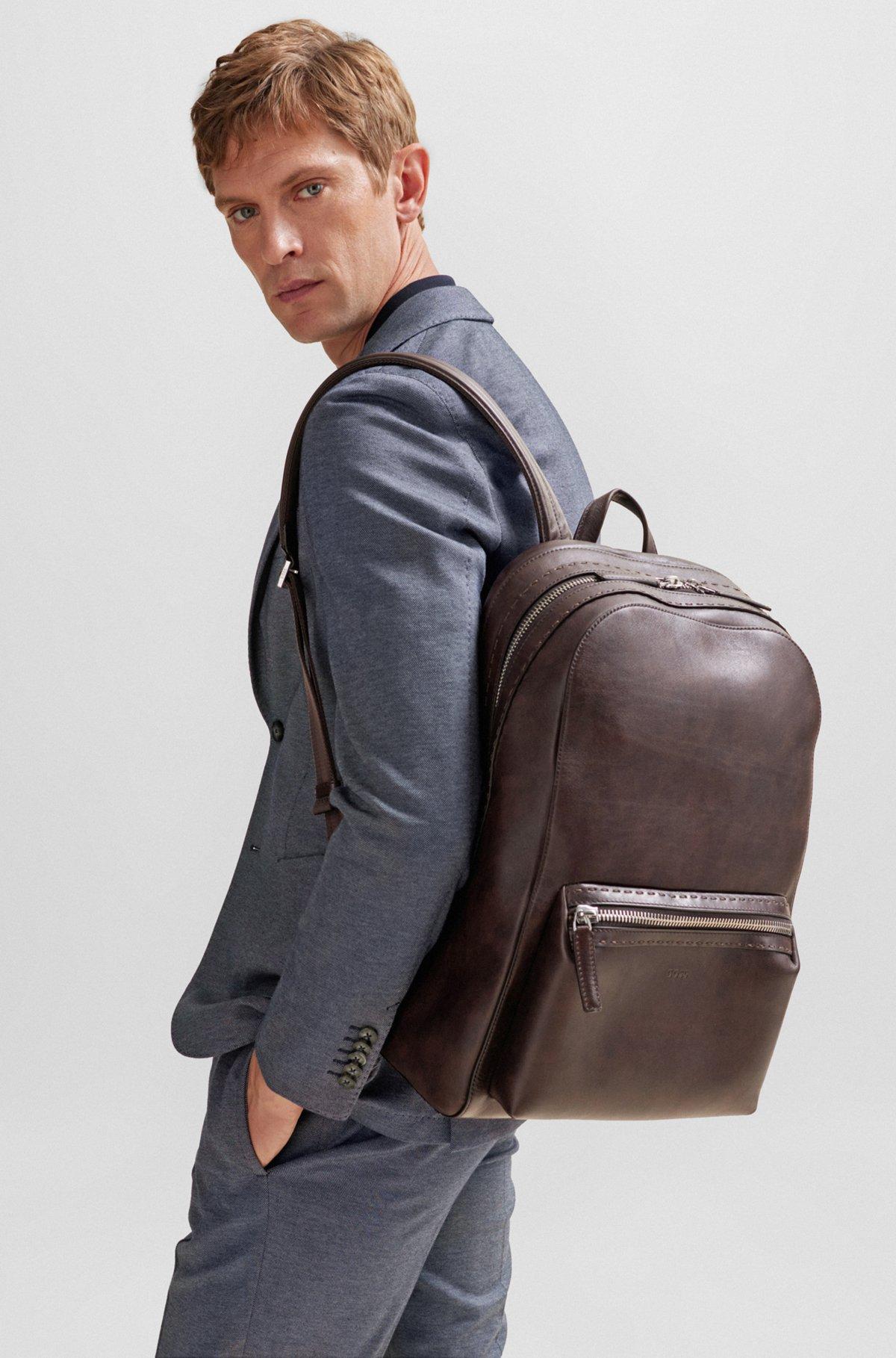 Leather backpack with embossed logo Product Image