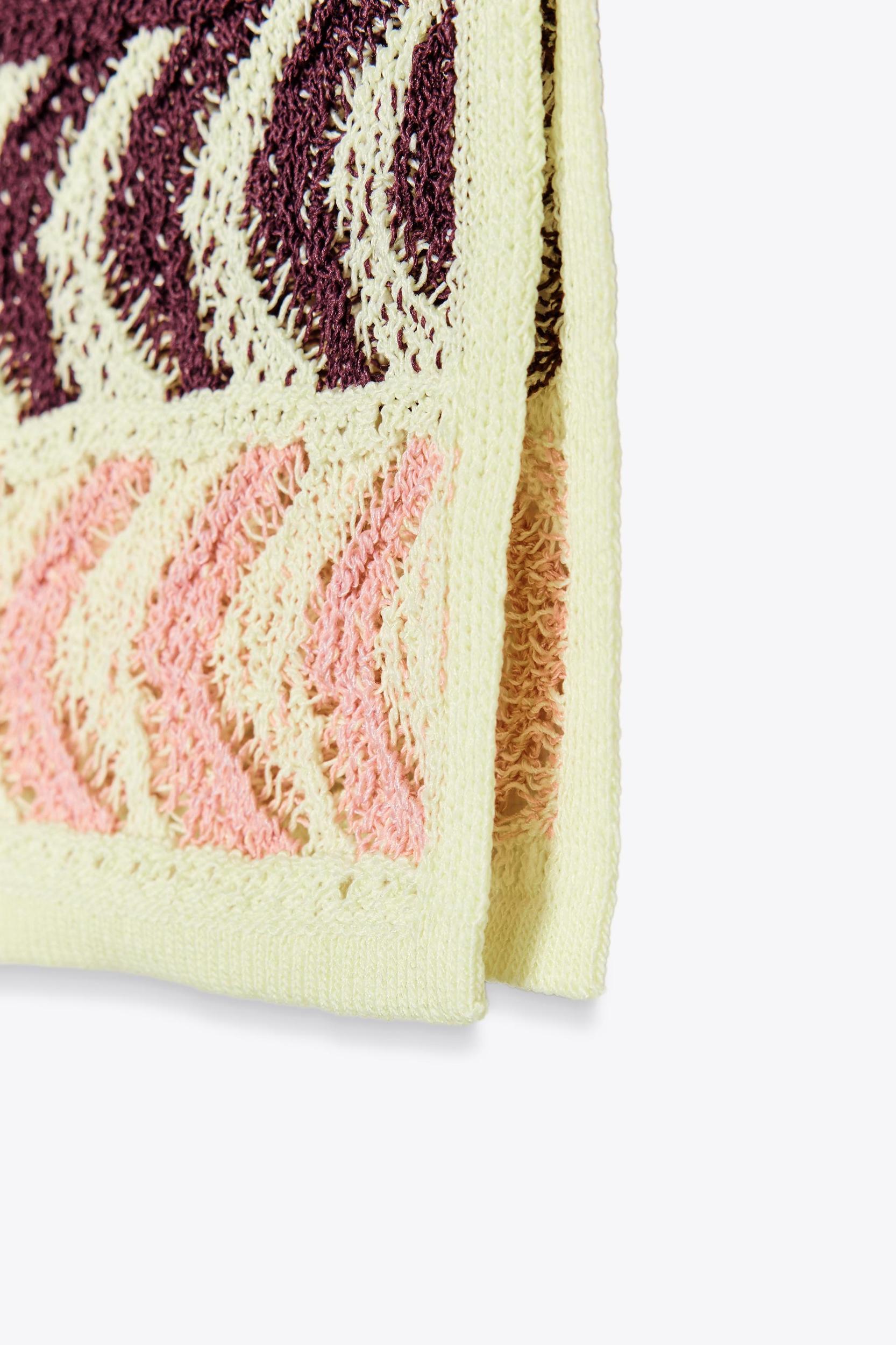 ASYMMETRIC STRUCTURED KNIT TOP Product Image
