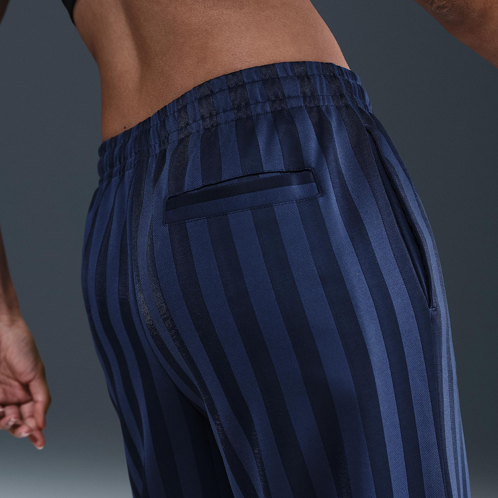 Nike Sportswear Women's Mid-Rise Loose Jacquard Striped Track Pants Product Image