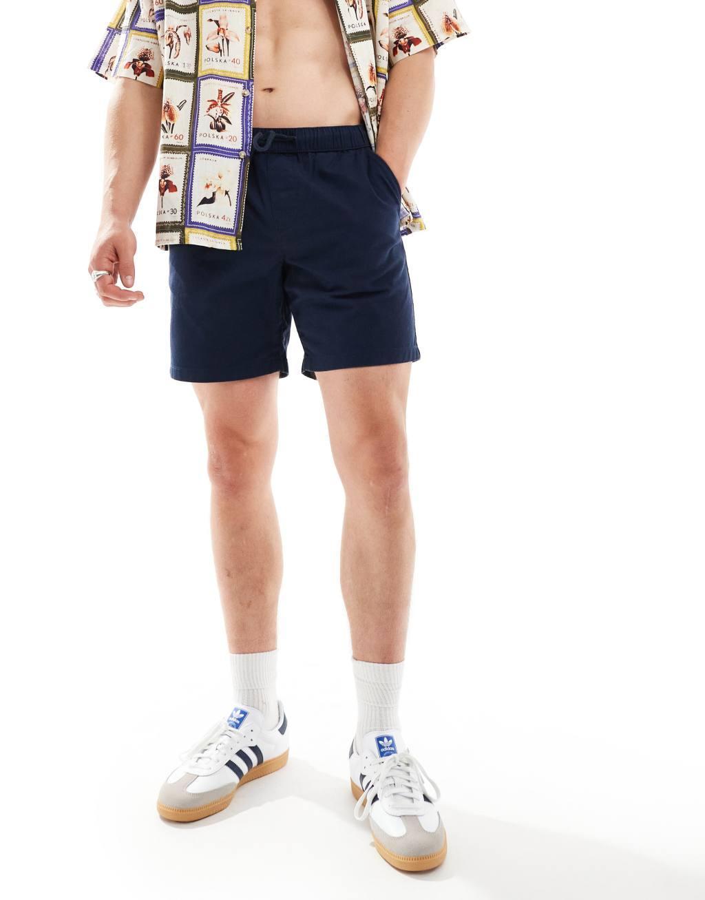 ASOS DESIGN slim chino shorts in navy Product Image