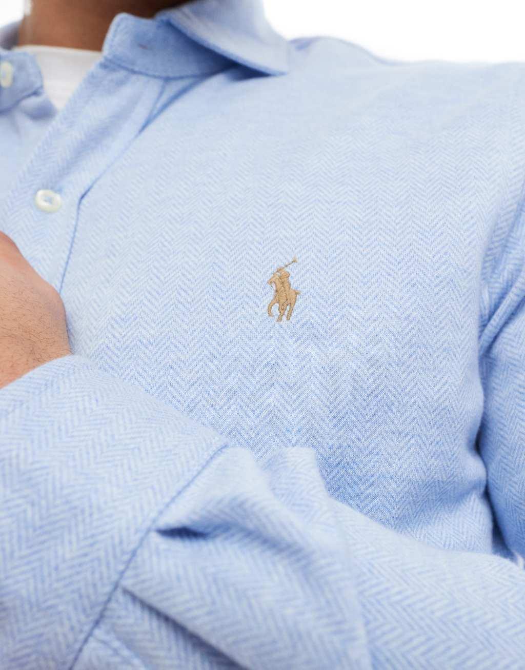 Polo Ralph Lauren icon logo estate collar herringbone print jersey shirt in light blue heather Product Image